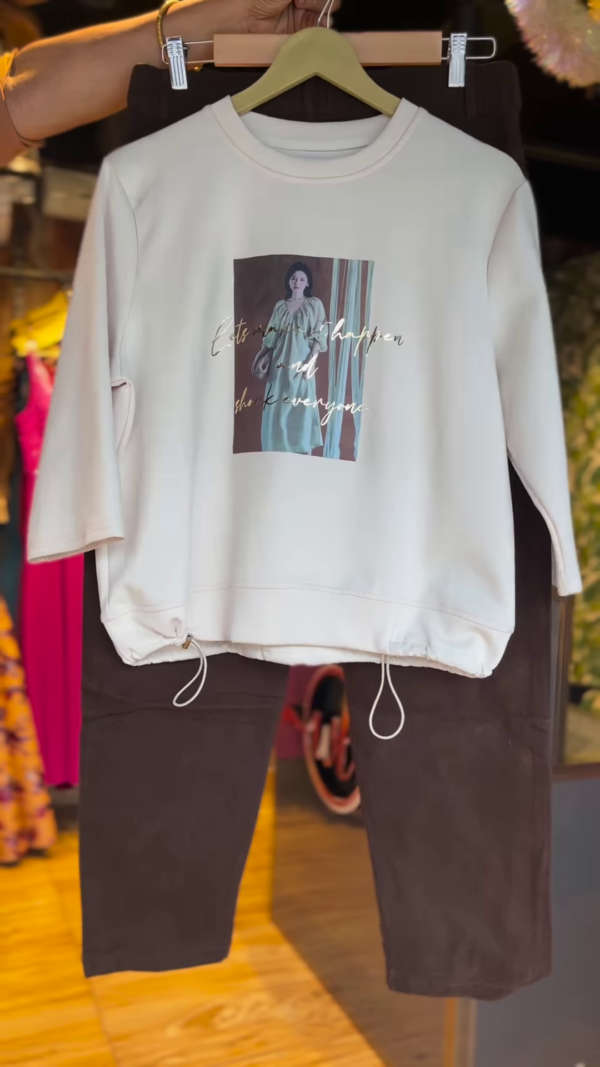 Cream Graphic Sweatshirt with Drawstring Hem & Brown Trousers – Casual Street Style Co-Ord Set for Women